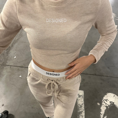 Tuta “designed” Beige